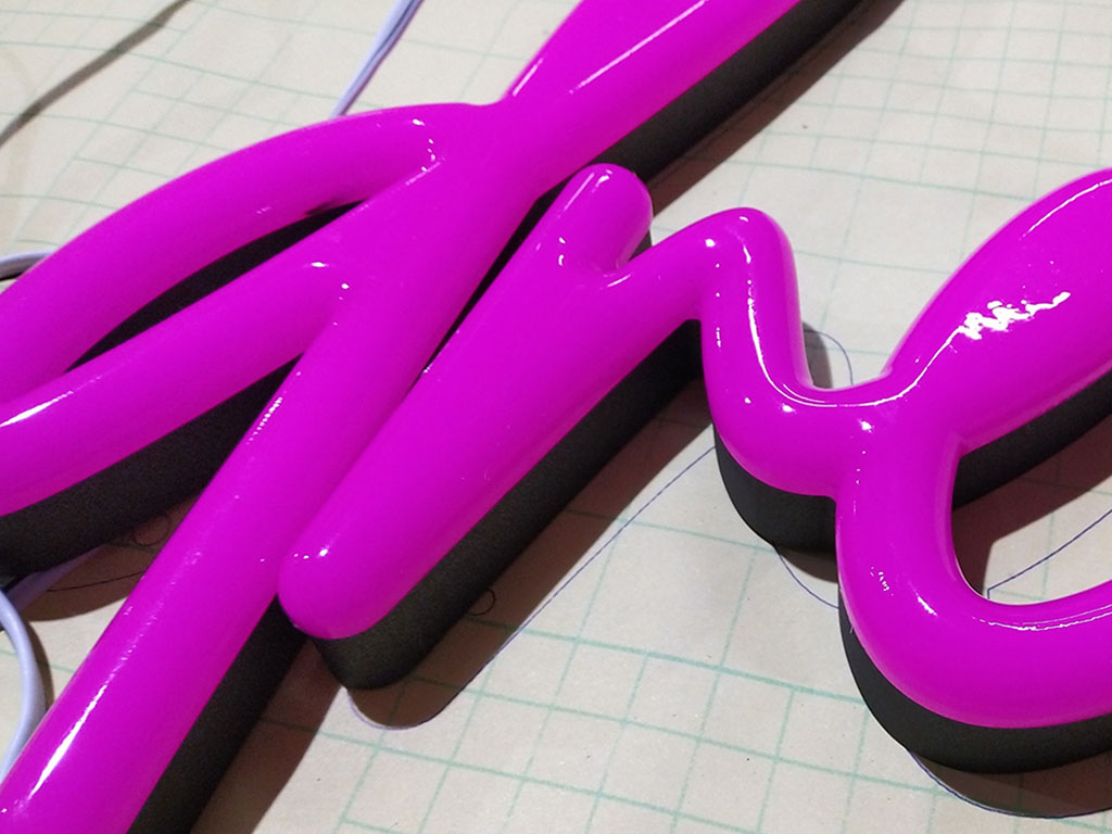 Illuminated signage (neon)